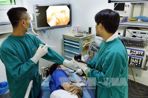 Hà Nội đẩy mạnh xã hội hóa, nâng cao chất lượng khám chữa bệnh ảnh 1